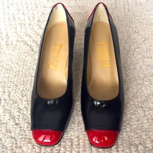 New without tags. Black and red patent heels.